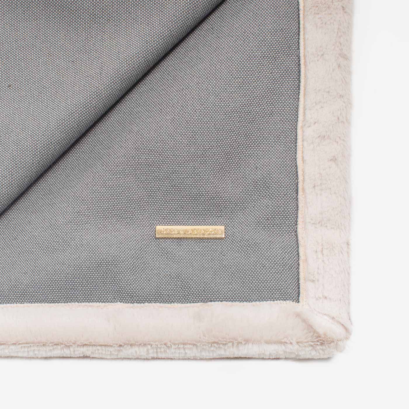 Present your furry friend with our luxuriously thick, plush blanket for your pet. Featuring a reverse side with hardwearing woven fabric handmade in Italy for the perfect high-quality pet blanket! Essentials Twill Blanket In Slate, Available now at Lords & Labradors US