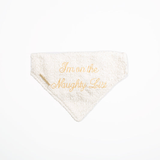 Discover The Perfect Bandana For Dogs, ' I'm on the Naughty List ' Dog Bandana In Luxury Ivory Bouclé, Available To Now at Lords & Labradors US